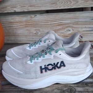 Hoka Skyflow Cream and Black Athletic Shoes